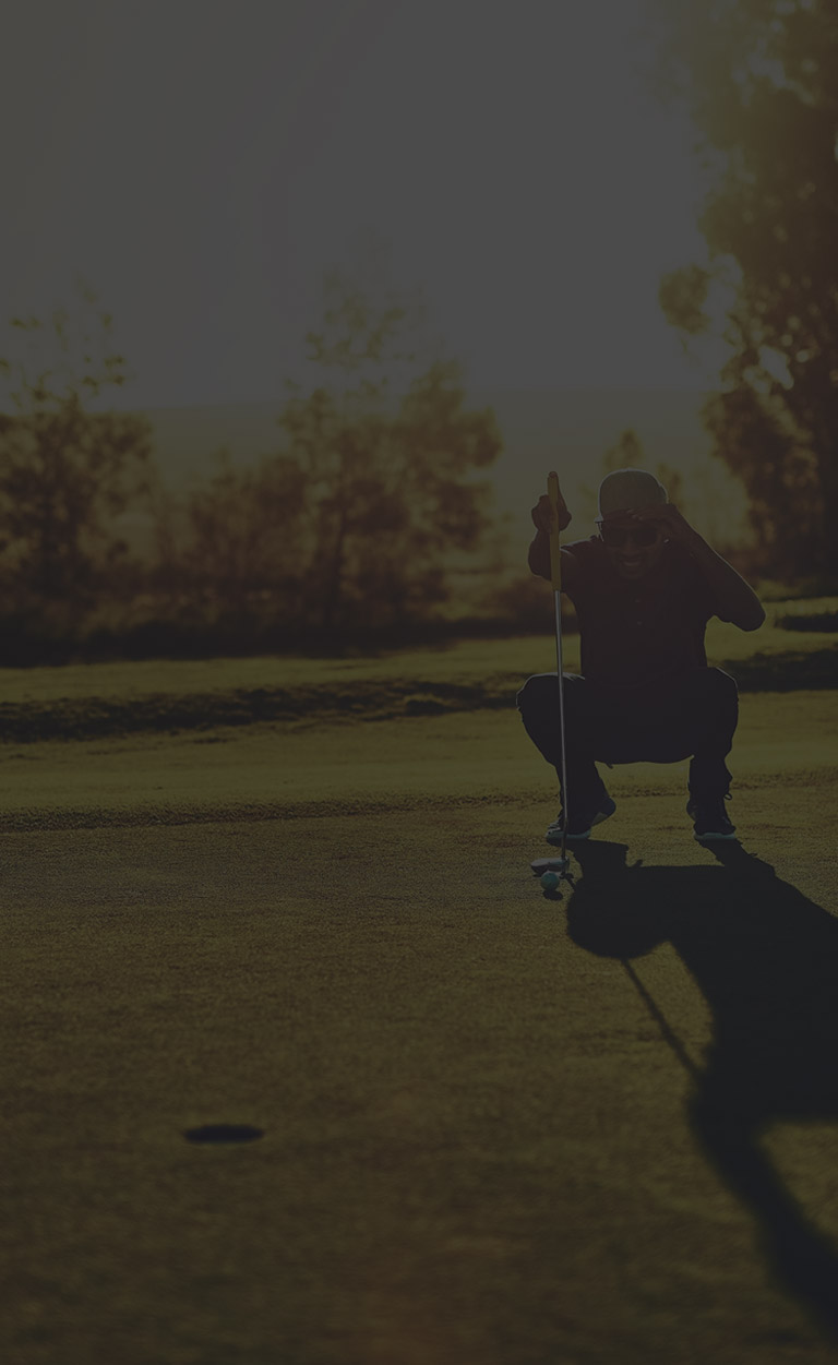 Golfer reading the green mobile